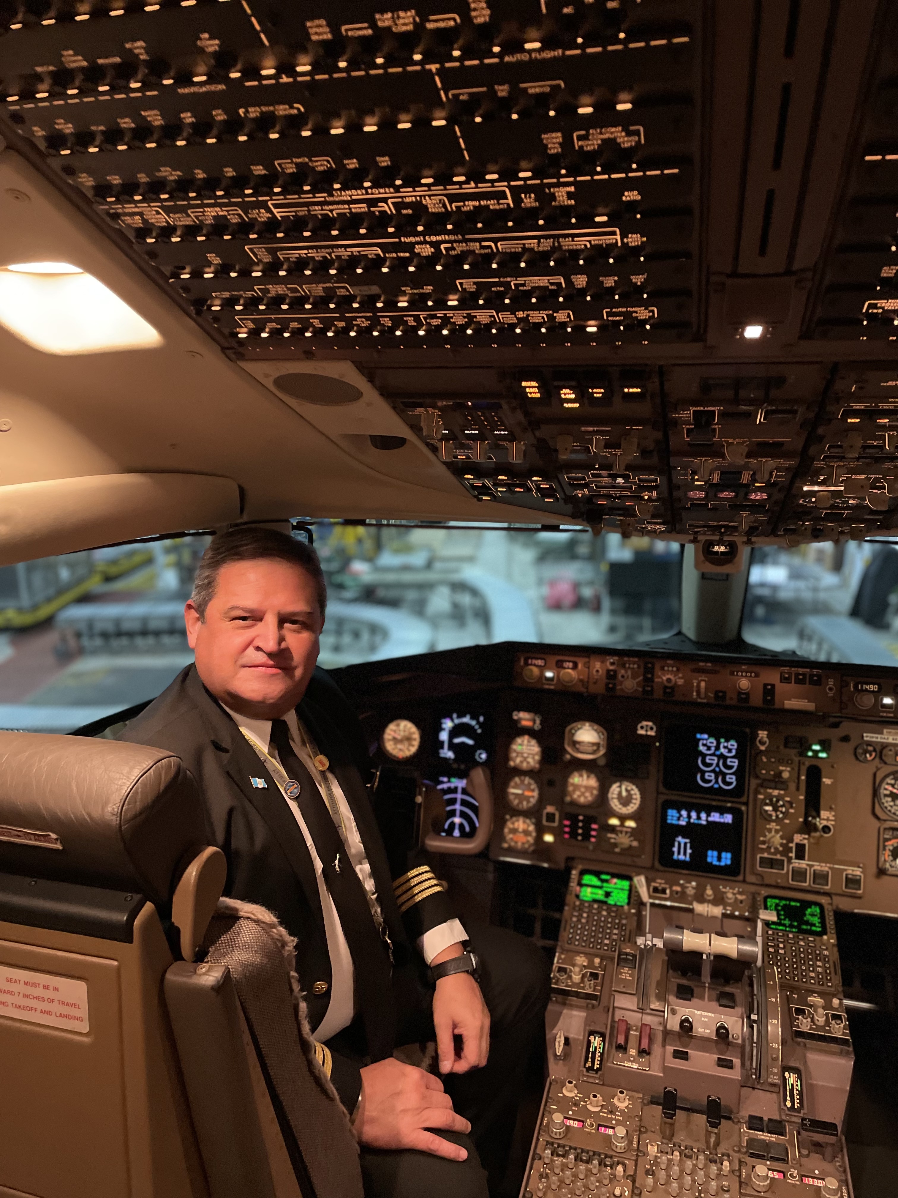 Captain Cesar Caceres – here shown as the Captain on a Boeing 757-200 – has been an aviator pilot with DHL Guatemala for 30 years, and working within the Disaster Response Team (DRT) & Get Airports Ready for Disasters (GARD) team as a volunteer, instructor, and DRT &GARD Lead Coordinator in Guatemala for 12 years. Photo: Deutsche Post DHL Group