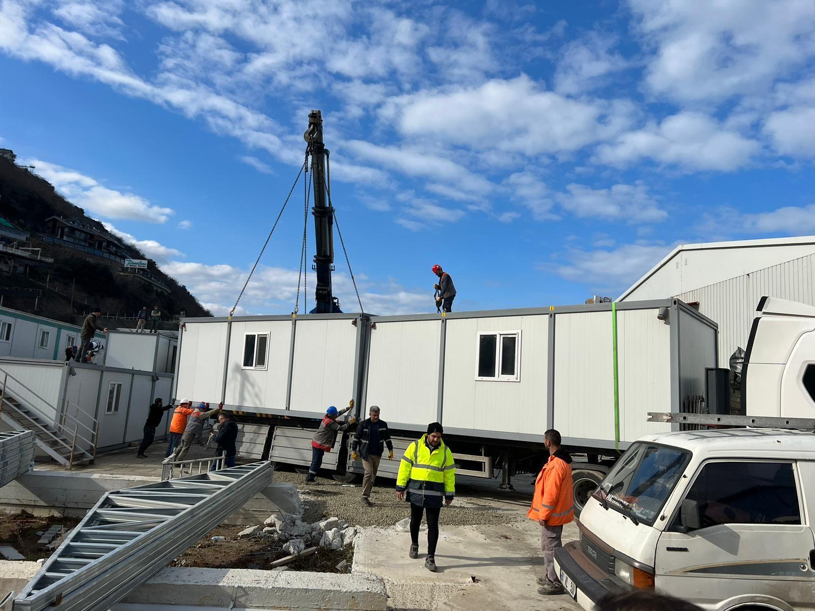 TÜRKONFED has provided nearly 400 shipping containers like this one to provide mid-term housing solutions for earthquake victims.